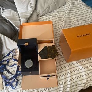 Authentic Louis Vuitton tambour horizon complete in great shape.trades welcome